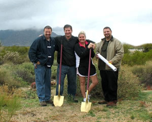 Paul and Teresa M breaking ground with Mike and Charlie Frat for their new custom home