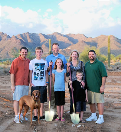 Nolan and Jennifer and family breaking ground with Mike Frat for their new custom home